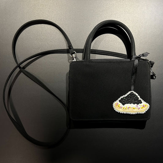 caviar bag charm